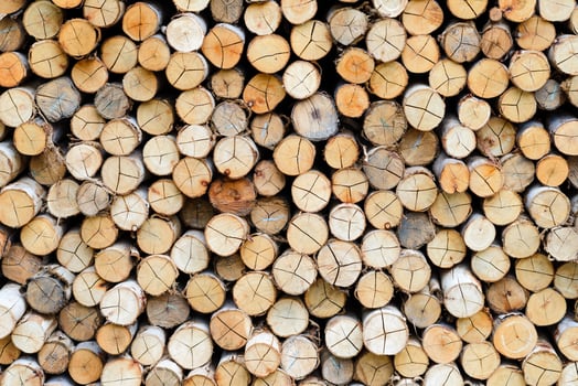 wall firewood - stacked of firewood prepare for the fireplace, barbecue, Background and texture. photo