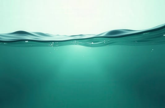 Light filtering through the surface of calm turquoise water photo
