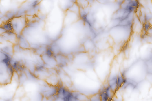 Elegant gold and white marble texture with organic patterns photo