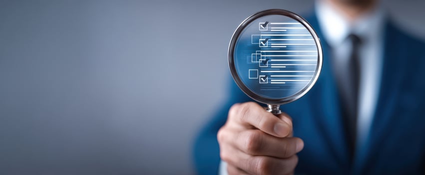 The magnifying glass revealing important business data and insights. photo