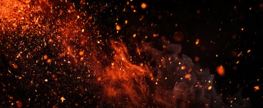The mesmerizing display of fiery particles and glowing embers against a dark backdrop photo