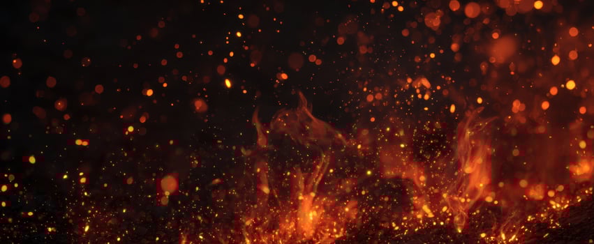 The mesmerizing dance of flames and sparks against a dark backdrop. photo