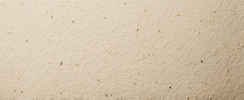 The textured beige paper background for creative artistic projects. photo