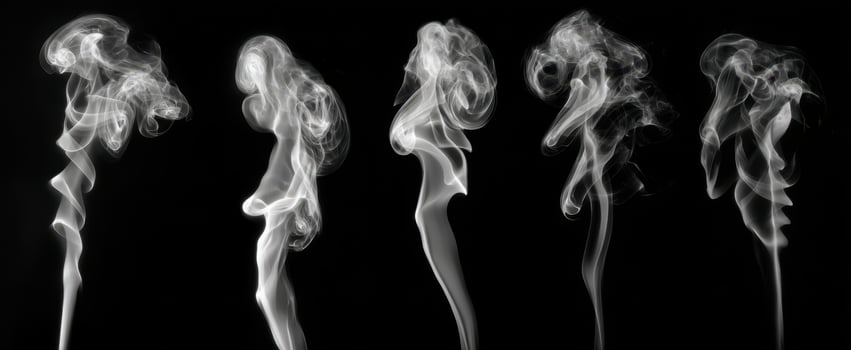 The captivating dance of smoke forming abstract shapes on a dark background. photo
