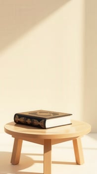 Quran book resting on wooden stool in sunlight interior photo