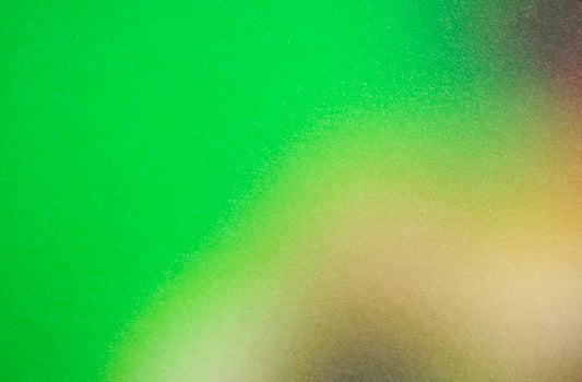 Green and brown gradient background creating a textured visual effect photo