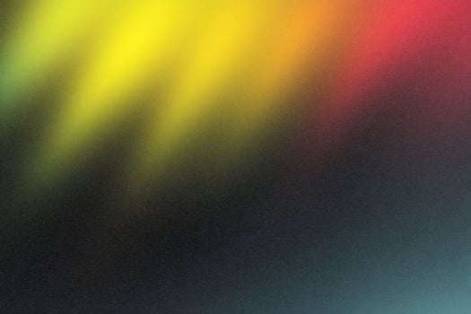 Abstract blurry background with vibrant yellow, orange, and red gradient photo