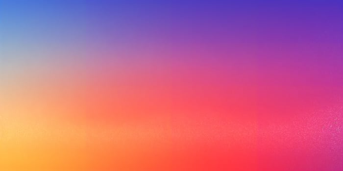 Colorful gradient background fading from blue to orange with noise texture photo