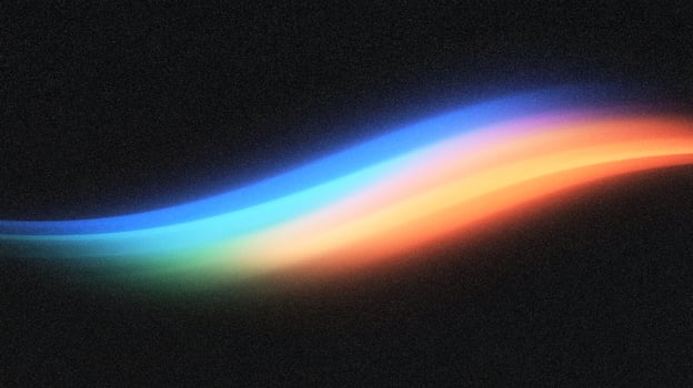 Abstract colorful light waves on black background photo