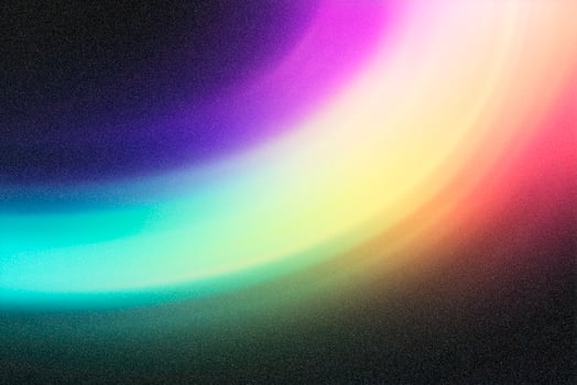 Colorful light trails creating vibrant gradients on dark background photo