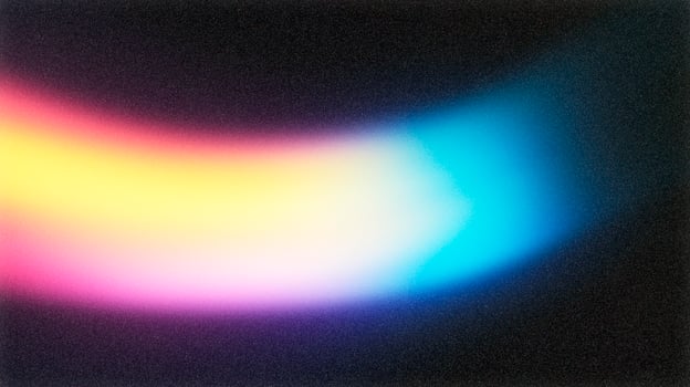 Colorful light leak creating abstract background with film grain photo