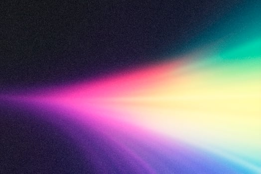 Vibrant light beam shining through colorful spectrum on textured background photo