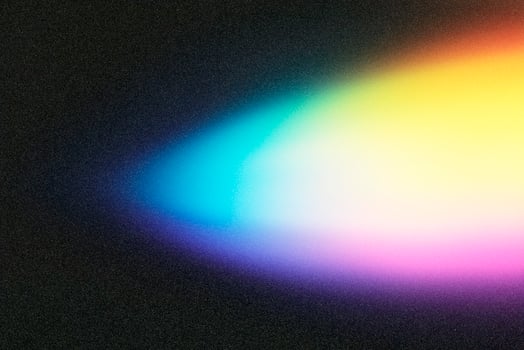 Light beam forming diagonal gradient on black background photo