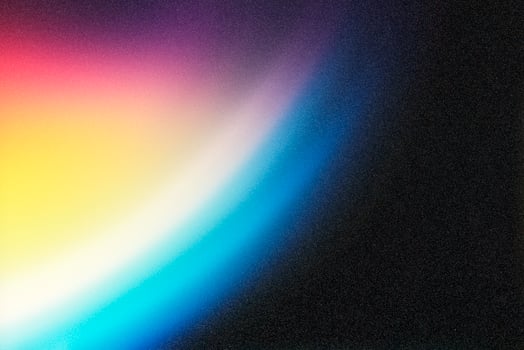 Colorful light leak gradient background blending from black to vivid colors photo