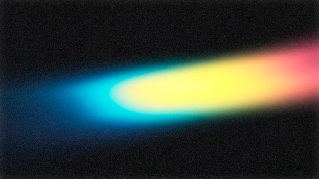 Light trail painting a colorful streak across a textured black background photo
