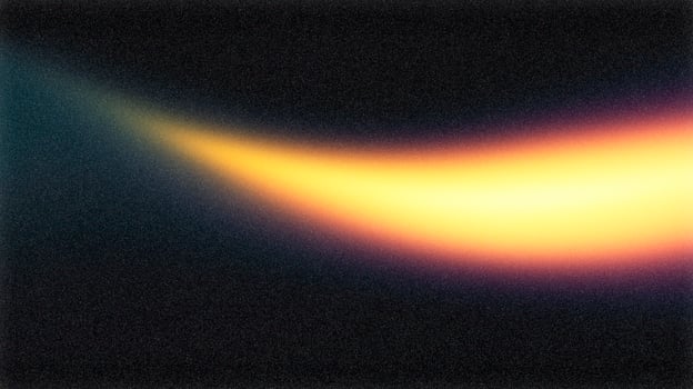 Light streak creating a warm glow on dark background photo