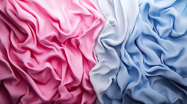 Soft, draped fabric in pink and light blue photo