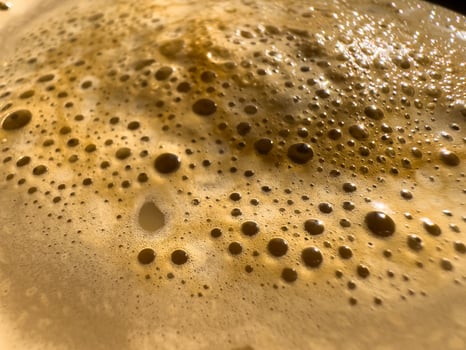 Coffee foam extreme close-up texture background photo