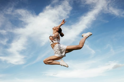 Beautiful,,, sky at background. Young skinny fitness woman is outdoors photo