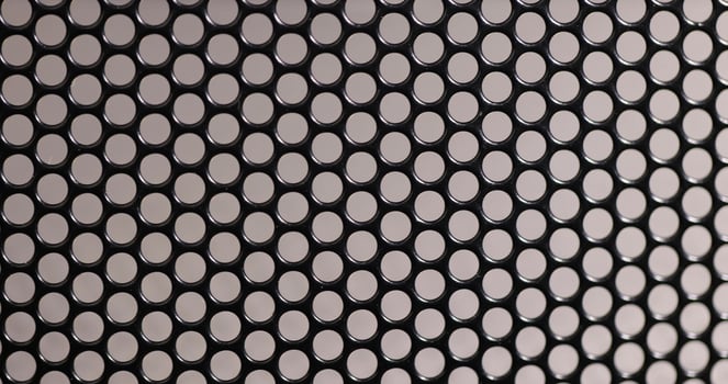 a mesh to protect electrical appliances from debris and other objects that can damage the appliance, a metal mesh with small holes photo