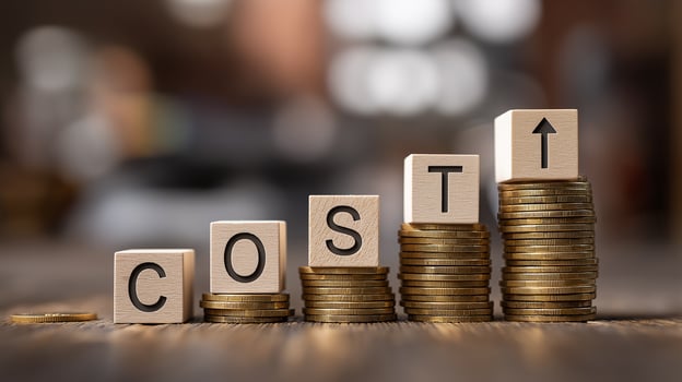 COST Written on a Wooden Cubes. Rising Costs and High Interest Rates Impact with Financial Challenges and Expense Growth. Budget Analysis, Inflation and Cost Management. photo