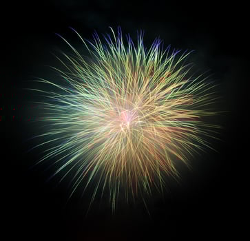 Colorful fireworks exploding black background photo
