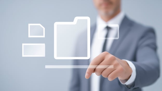 Businessman in a suit interacting with digital interface, selecting file icons and folders, showcasing modern technology and digital organization concepts in a professional environment photo
