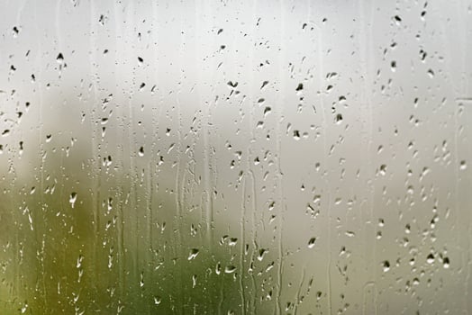 Closeup of Rain Drops on Glass Window photo