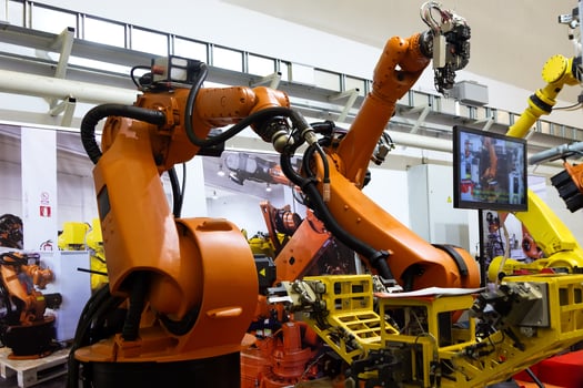 Industrial robot in smart warehouse system for manufacture factory photo