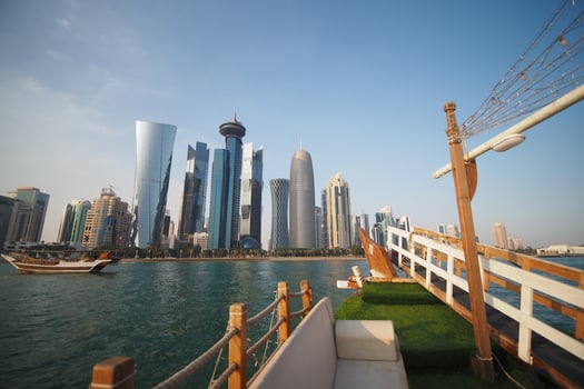 qatar doha 20 february 2025. Modern skyline viewed from traditional boat in Qatar photo