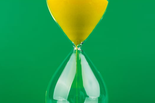 Hourglass The process of time running out The rule of limited time photo