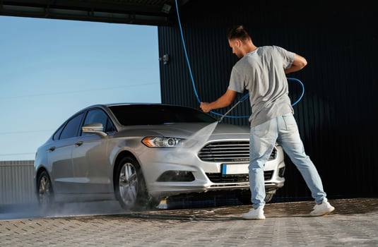 Self-service, car ,wash. Man is with his automobile outdoors photo