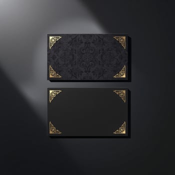 Black and gold business card with gold frame photo