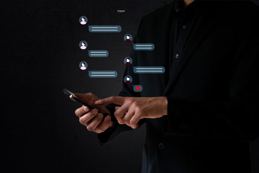 The Business man work with smartphone talk to friends with chat application photo