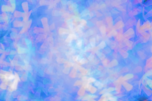 Colorful blue violet figured Bokeh Lights as Soft Pastel Background, Abstract bokeh background, natural flare from lights, blurred texture as holiday backdrop, celebration idea with optical effect photo