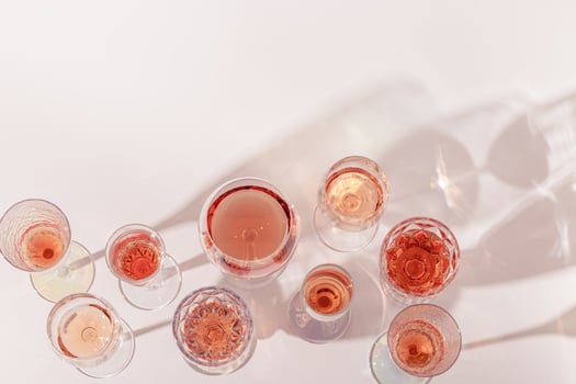 Various glasses of rose wine or champagne sweet and dry, top view. Light alcohol sparkling drink for parties photo
