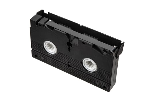 Classic VHS cassette with visible tape reels photo