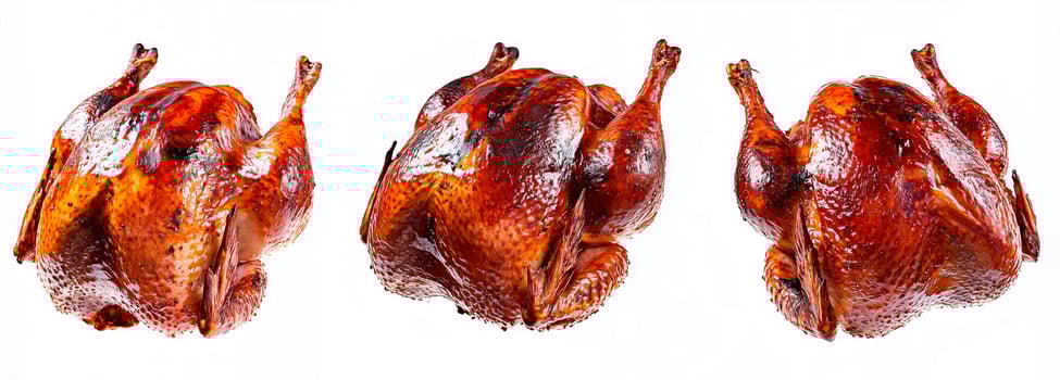 Whole roasted chicken isolated on white background with clipping path photo