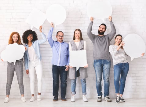 Social comments. Group of diverse people holding blank speech bubbles, empty space photo