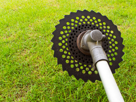 Circular saw blade of grass cutter photo