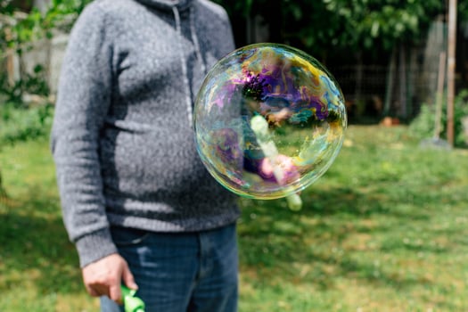 Soap bubble, outdoors activity and leisure for happy kid, real life photo, ball photo