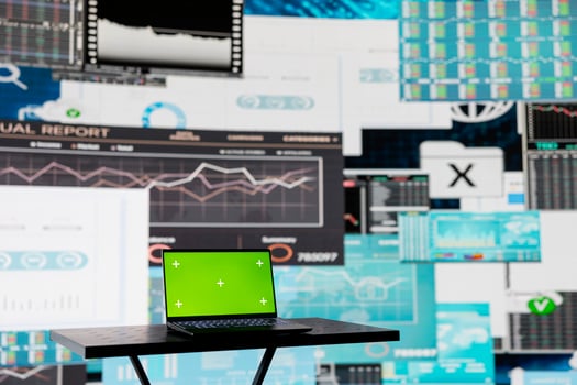 In a business finance space, laptop showing isolated chroma key to help the strategy planning with financial data. Representing high tech artificial intelligence and productivity for growth. photo