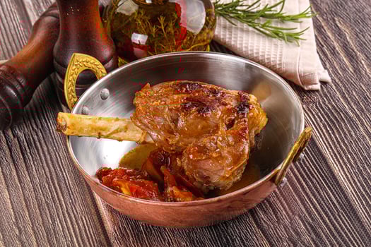 A pan with a meat dish in it photo