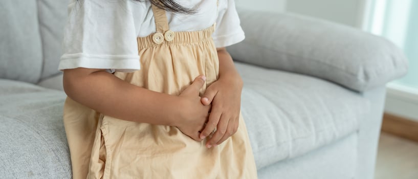 stomach ache. Children have abdominal pain, indigestion, gastritis, menstrual cramps, flatulence, diarrhea, distention, colon cancer, belly inflammation problem, food poisoning, abdomen photo