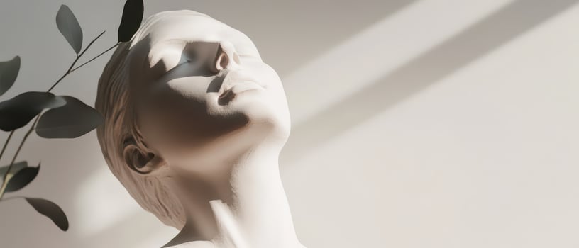 Serene figure sculpture in natural light photo