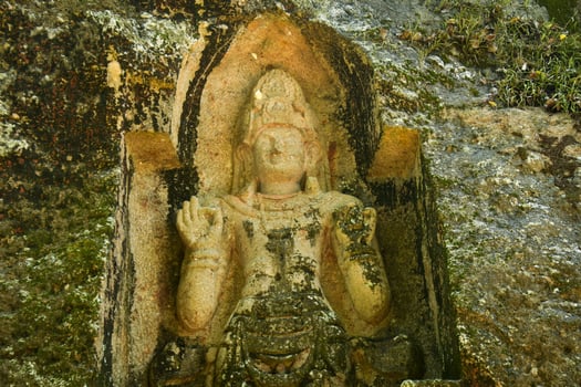 Kushtarajagala Ancient rock-carved statue in Weligama, Sri Lanka, believed to depict Bodhisattva or healing king. A unique symbol of Sri Lanka Buddhist heritage and early stone artistry photo