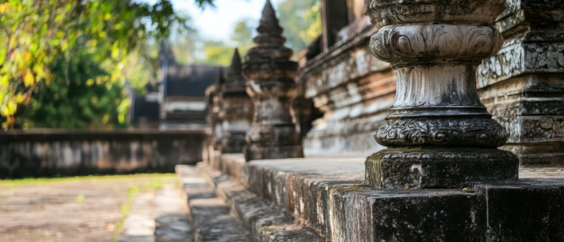 Historic stone pillars in ancient temple landscape photo