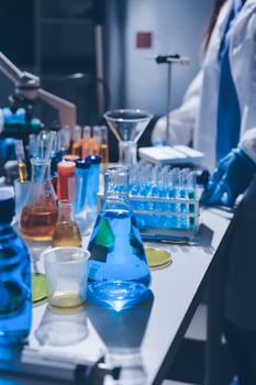 A laboratory with many different liquids and chemicals photo