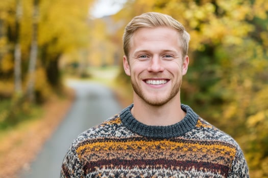 Smiling Man in Autumn Sweater photo