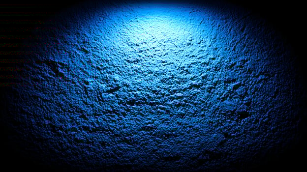 Blue Illuminated Rough Wall Texture Dark Background photo